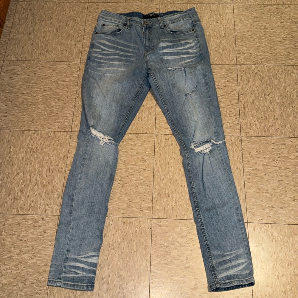 /serenedē/ Sedona 2.0 Stretch Skinny Jean in
Destroyed Ice Crush Blue size 32x34